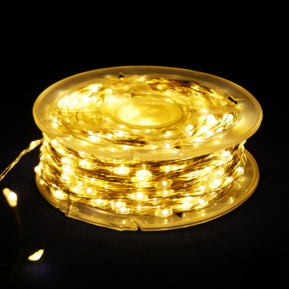 Гірлянда Роса 100м 1000 LED (тепло-біла, на білому)